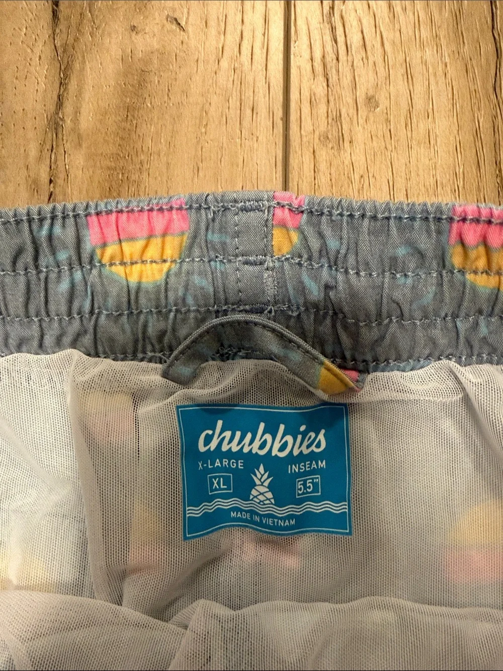 chubbies Blue Swim Trunks with Pink & Yellow Sunrise Pattern
